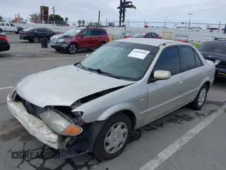 2002 Mazda Protege DX with VIN JM1BJ225121620394, listed as a IAAI auction lot 42043056 with 187,360 mi miles and . Bid and sale history available at DreamBid. Image 18.