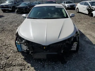 2013 Lincoln MKZ z VIN 3LN6L2G98DR804632, wystawiony jako Copart lot #56985055 z przebiegiem 128 509 mil mil oraz Szkoda całkowita • Salvage title. Historia ofert i sprzedaży dostępna na DreamBid. Obrazek 5.