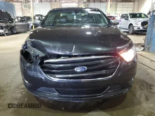 2013 Ford Taurus Limited z VIN 1FAHP2F8XDG142592, wystawiony jako Copart lot #52751465 z przebiegiem 152 883 mil mil oraz Czysty tytuł • Clean title. Historia ofert i sprzedaży dostępna na DreamBid. Obrazek 5.