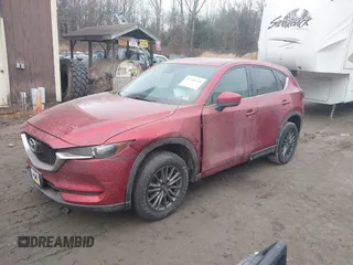 2017 Mazda CX-5 Touring with VIN JM3KFBCL9H0196693, listed as a IAAI auction lot 41136650 with 126,087 mi miles. Bid and sale history available at carsss.com. Image 2.