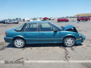 1995 Saturn SL with VIN 1G8ZK5275SZ303745, listed as a IAAI auction lot 42280801 with 137,719 mi miles and . Bid and sale history available at DreamBid. Image 13.