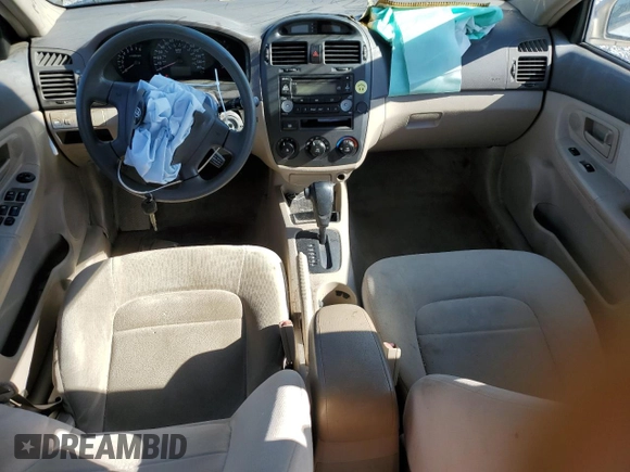 2006 Kia Spectra EX z VIN KNAFE121265353582, wystawiony jako Copart lot #52747635 z przebiegiem 99 087 mil mil oraz Szkoda całkowita • Salvage title. Historia ofert i sprzedaży dostępna na DreamBid. Obrazek 8.