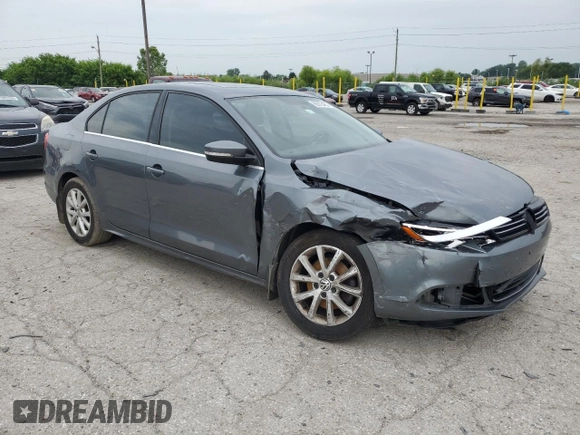 2014 Volkswagen Jetta SE with VIN 3VWD07AJ7EM363186, listed as a Copart auction lot 60873465 with 215,323 mi miles and Salvage title. Bid and sale history available at DreamBid. Image 4.