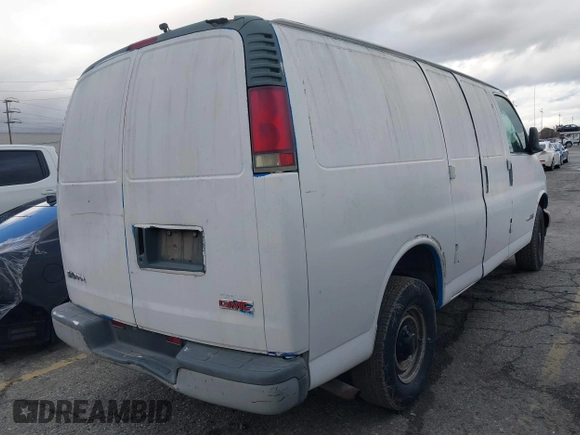 2002 GMC Savana z VIN 1GTHG35F021200273, wystawiony jako IAAI lot #41600511 z przebiegiem 230 052 mil mil oraz . Historia ofert i sprzedaży dostępna na DreamBid. Obrazek 4.