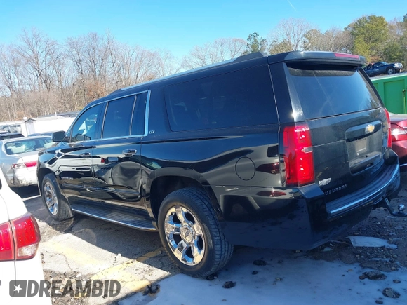 2015 Chevrolet Suburban LTZ with VIN 1GNSCKKC3FR249956, listed as a IAAI auction lot 41306605 with 122,942 mi miles and . Bid and sale history available at DreamBid. Image 14.