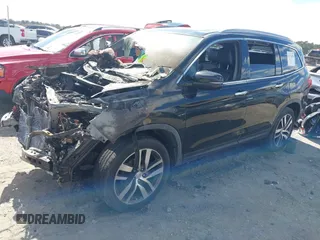 2016 Honda Pilot Elite with VIN 5FNYF6H0XGB127133, listed as a IAAI auction lot 41723875 with Not Provided miles. Bid and sale history available at carsss.com. Image 17.