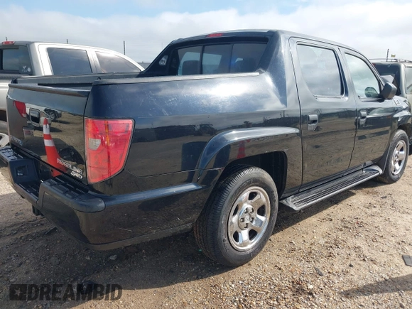 2009 Honda Ridgeline RT with VIN 5FPYK16239B101213, listed as a IAAI auction lot 42619661 with 191,390 mi miles and . Bid and sale history available at DreamBid. Image 4.