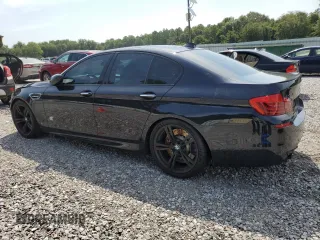 2016 BMW M5 z VIN WBSFV9C55GD595799, wystawiony jako Copart lot #65708864 z przebiegiem 104 198 mil mil oraz Szkoda całkowita • Salvage title. Historia ofert i sprzedaży dostępna na DreamBid. Obrazek 2.