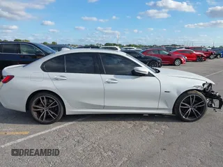 2022 BMW 3 Series 330e with VIN 3MW5P7J08N8C65252, listed as a IAAI auction lot 41229681 with 27,606 mi miles. Bid and sale history available at carsss.com. Image 14.
