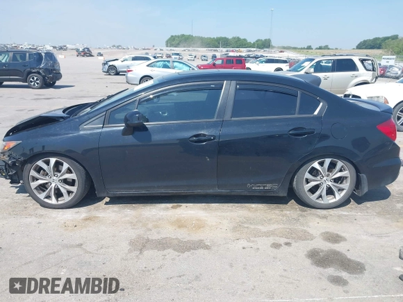 2012 Honda Civic Si z VIN 2HGFB6E57CH700823, wystawiony jako IAAI lot #42477635 z przebiegiem 144 889 mil mil oraz . Historia ofert i sprzedaży dostępna na DreamBid. Obrazek 14.