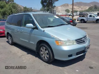 2003 Honda Odyssey EX with VIN 5FNRL18693B114825, listed as a IAAI auction lot 42637414 with 209,306 mi miles and . Bid and sale history available at DreamBid. Image 1.