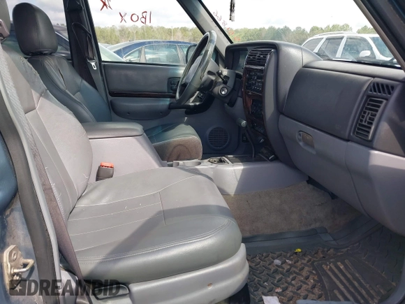 1998 Jeep Cherokee Sport with VIN 1J4FT68S0WL125382, listed as a IAAI auction lot 41551866 with 1 mi miles. Bid and sale history available at carsss.com. Image 5.