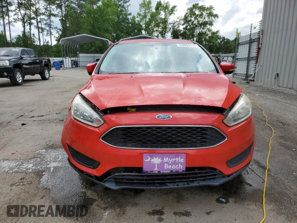 2016 Ford Focus SE z VIN 1FADP3F26GL363912, wystawiony jako Copart lot #54059175 z przebiegiem 166 827 mil mil oraz Szkoda całkowita • Salvage title. Historia ofert i sprzedaży dostępna na DreamBid. Obrazek 5.