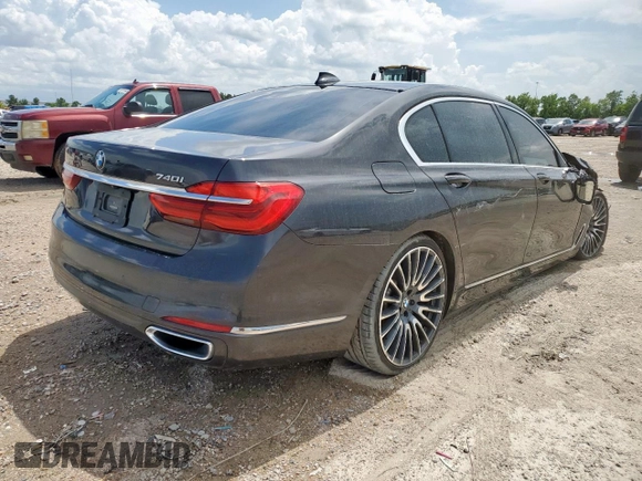 2016 BMW 7 Series 740i with VIN WBA7E2C57GG714564, listed as a Copart auction lot 64005965 with 111,598 mi miles and Salvage title. Bid and sale history available at DreamBid. Image 3.