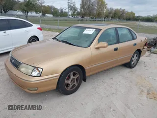 1998 Toyota Avalon XL with VIN 4T1BF18B0WU265372, listed as a IAAI auction lot 41620179 with Not Provided miles and . Bid and sale history available at DreamBid. Image 2.