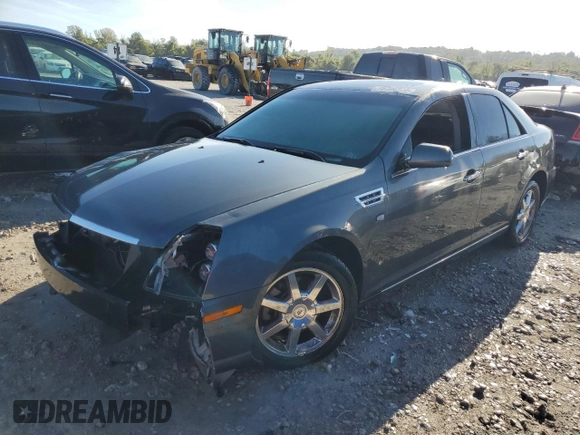 2009 Cadillac STS RWD z VIN 1G6DW67V390104597, wystawiony jako Copart lot #73794724 z przebiegiem Nie podano mil oraz Szkoda całkowita • Salvage title. Historia ofert i sprzedaży dostępna na DreamBid. Obrazek 1.