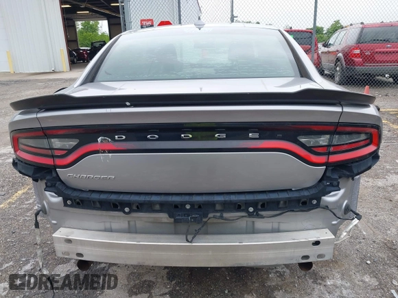2015 Dodge Charger SXT with VIN 2C3CDXHG1FH886088, listed as a IAAI auction lot 42331369 with 119,659 mi miles and . Bid and sale history available at DreamBid. Image 6.
