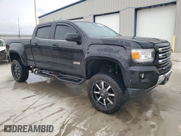 2015 GMC Canyon 4WD SLE with VIN 1GTG6BE30F1185696, listed as a Copart auction lot 51091255 with 173,322 mi miles and Salvage Title. Bid and sale history available at carsss.com. Image 4.