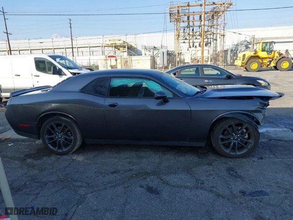 2021 Dodge Challenger GT with VIN 2C3CDZKG4MH677574, listed as a IAAI auction lot 41460036 with 67,170 mi miles. Bid and sale history available at carsss.com. Image 12.