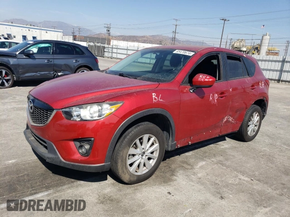 2014 Mazda CX-5 Touring with VIN JM3KE2CY9E0356050, listed as a Copart auction lot 65470674 with 70,400 mi miles and Salvage Title. Bid and sale history available at DreamBid. Image 1.