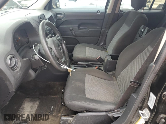2015 Jeep Patriot Sport with VIN 1C4NJPBA2FD328846, listed as a Copart auction lot 51698285 with 146,674 mi miles and Salvage Title. Bid and sale history available at carsss.com. Image 7.