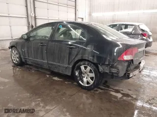 2010 Honda Civic Sdn LX with VIN 19XFA1F52AE019903, listed as a IAAI auction lot 41521612 with 116,557 mi miles. Bid and sale history available at carsss.com. Image 3.