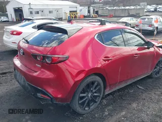 2020 Mazda Mazda3 Hatchback Premium Package with VIN JM1BPBNM6L1157087, listed as a IAAI auction lot 41681118 with 42,007 mi miles. Bid and sale history available at carsss.com. Image 4.