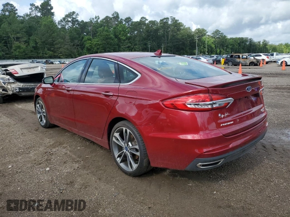 2019 Ford Fusion Titanium with VIN 3FA6P0D99KR206523, listed as a Copart auction lot 61007545 with 87,715 mi miles and Clean title. Bid and sale history available at DreamBid. Image 2.