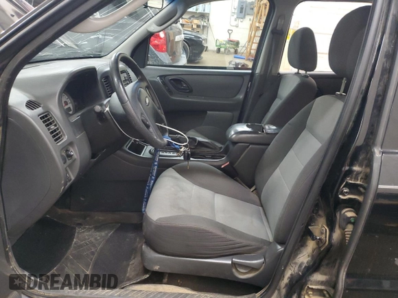 2005 Ford Escape XLS Value with VIN 1FMYU92Z05DA10448, listed as a Copart auction lot 54438955 with 185,303 mi miles and Salvage title. Bid and sale history available at DreamBid. Image 7.