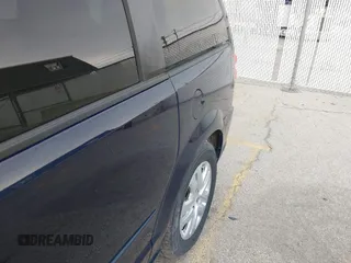2015 Dodge Grand Caravan American Value with VIN 2C4RDGBG2FR615100, listed as a IAAI auction lot 42002131 with 178,507 mi miles and . Bid and sale history available at DreamBid. Image 11.