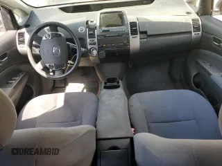 2007 Toyota Prius z VIN JTDKB20U373216659, wystawiony jako Copart lot #60930375 z przebiegiem 155 283 mil mil oraz Czysty tytuł • Clean title. Historia ofert i sprzedaży dostępna na DreamBid. Obrazek 8.