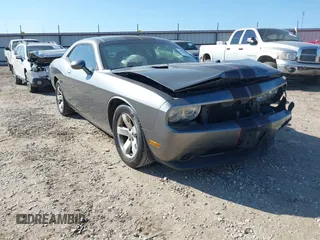 2011 Dodge Challenger z VIN 2B3CJ4DG3BH512974, wystawiony jako IAAI lot #41431931 z przebiegiem 186 845 mil mil oraz . Historia ofert i sprzedaży dostępna na DreamBid. Obrazek 1.