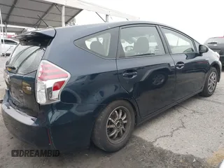 2017 Toyota Prius v Two with VIN JTDZN3EU2HJ061734, listed as a IAAI auction lot 41517072 with 99,294 mi miles. Bid and sale history available at carsss.com. Image 4.