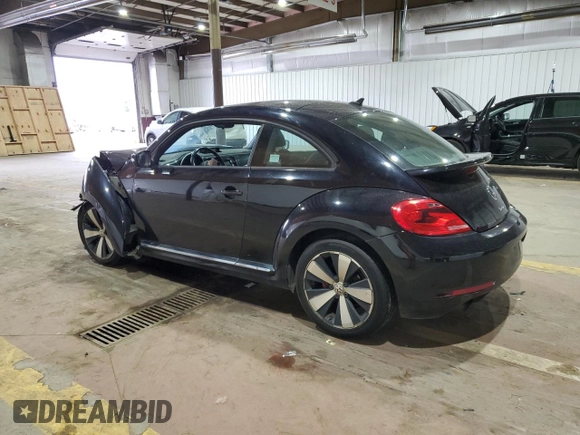 2014 Volkswagen Beetle Turbo R-Line with VIN 3VWVT7ATXEM665178, listed as a Copart auction lot 75652044 with Not Provided miles and Salvage Title. Bid and sale history available at DreamBid. Image 2.
