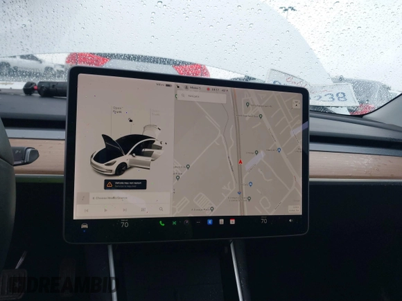 2020 Tesla Model 3 Standard Range Plus with VIN 5YJ3E1EA2LF740225, listed as a IAAI auction lot 41781554 with 46,703 mi miles. Bid and sale history available at carsss.com. Image 7.