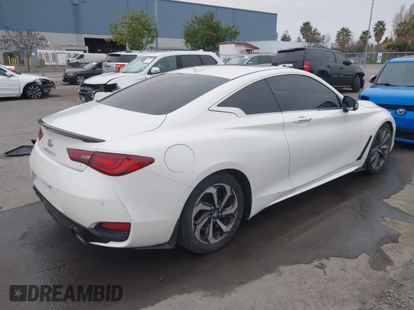 2021 Infiniti Q60 Red Sport 400 with VIN JN1FV7LK1MM530013, listed as a IAAI auction lot 41461752 with 52,844 mi miles and . Bid and sale history available at DreamBid. Image 4.
