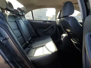 2014 Volkswagen Jetta TDI w/Premium z VIN 3VWLL7AJ8EM385667, wystawiony jako Copart lot #57804065 z przebiegiem 122 020 mil mil oraz Szkoda całkowita • Salvage title. Historia ofert i sprzedaży dostępna na DreamBid. Obrazek 10.