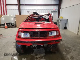 1992 Geo Tracker z VIN 2CNBJ18U1N6917736, wystawiony jako Copart lot #76609574 z przebiegiem Nie podano mil oraz Szkody całkowita. Historia ofert i sprzedaży dostępna na DreamBid. Obrazek 5.