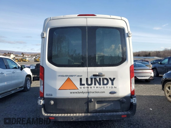2016 Ford Transit Cargo z VIN 1FTYR2CM8GKA40117, wystawiony jako Copart lot #42287895 z przebiegiem Nie podano mil oraz Szkoda całkowita • Salvage title. Historia ofert i sprzedaży dostępna na DreamBid. Obrazek 6.