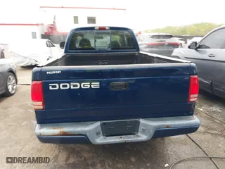 2002 Dodge Dakota Sport with VIN 1B7GL32X12S561414, listed as a IAAI auction lot 42060300 with 235,957 mi miles. Bid and sale history available at carsss.com. Image 16.