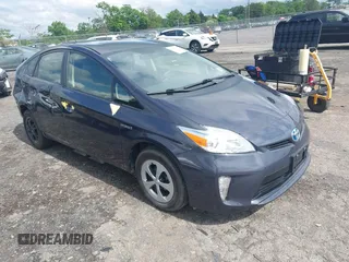 2014 Toyota Prius Four z VIN JTDKN3DUXE1816059, wystawiony jako IAAI lot #42268497 z przebiegiem 78 825 mil mil oraz . Historia ofert i sprzedaży dostępna na DreamBid. Obrazek 1.