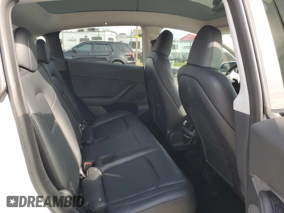 2023 Tesla Model Y Long Range z VIN 7SAYGDEE2PA065048, wystawiony jako Copart lot #48403655 z przebiegiem 56 553 mil mil oraz Szkoda całkowita • Salvage title. Historia ofert i sprzedaży dostępna na DreamBid. Obrazek 10.