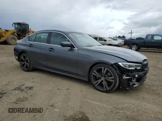 2021 BMW 3 Series 330e with VIN 3MW5P7J02M8B94208, listed as a Copart auction lot 48971455 with 22,228 mi miles and Salvage Title. Bid and sale history available at carsss.com. Image 4.