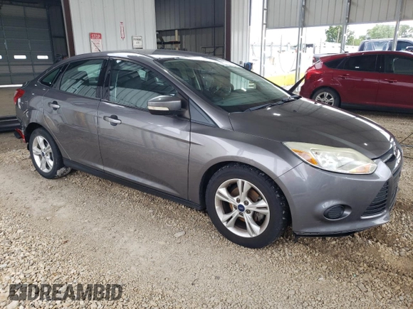 2013 Ford Focus SE with VIN 1FADP3F23DL319295, listed as a Copart auction lot 59927985 with 139,264 mi miles and Salvage title. Bid and sale history available at DreamBid. Image 4.