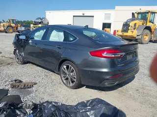 2020 Ford Fusion Titanium with VIN 3FA6P0K91LR175109, listed as a IAAI auction lot 42267532 with 75,000 mi miles and . Bid and sale history available at DreamBid. Image 3.