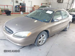 2002 Ford Taurus SES Standard with VIN 1FAFP55U32A171004, listed as a IAAI auction lot 41782261 with 105,967 mi miles. Bid and sale history available at carsss.com. Image 2.