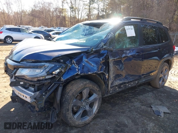 2019 Honda Passport Touring z VIN 5FNYF8H97KB013495, wystawiony jako IAAI lot #41397285 z przebiegiem 81 615 mil mil oraz . Historia ofert i sprzedaży dostępna na DreamBid. Obrazek 2.