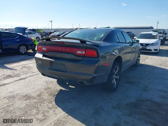2014 Dodge Charger SXT with VIN 2C3CDXHG2EH256675, listed as a IAAI auction lot 41278616 with 139,709 mi miles. Bid and sale history available at carsss.com. Image 4.