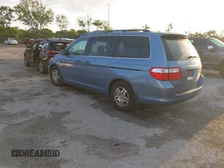 2007 Honda Odyssey EX-L z VIN 5FNRL38717B035384, wystawiony jako IAAI lot #41976861 z przebiegiem 211 640 mil mil oraz . Historia ofert i sprzedaży dostępna na DreamBid. Obrazek 3.