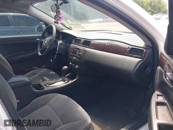 2015 Chevrolet Impala LS with VIN 2G1WA5E38F1121775, listed as a IAAI auction lot 42618932 with 151,653 mi miles and . Bid and sale history available at DreamBid. Image 5.